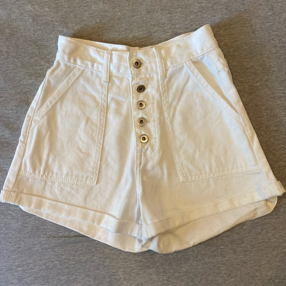White DISSH denim button fly cuffed shorts